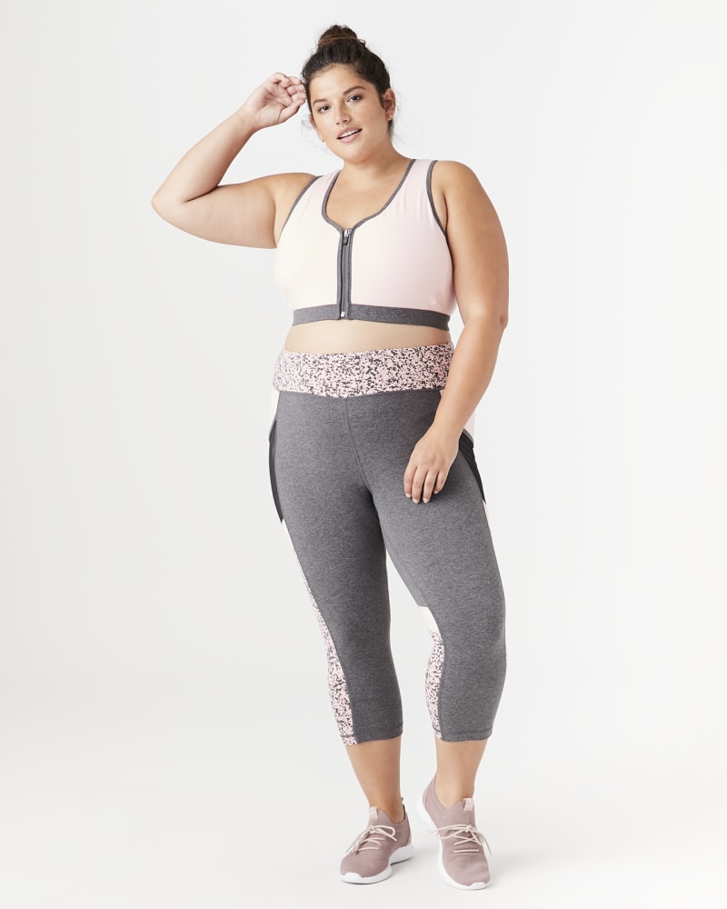 Plus size model with hourglass body shape wearing Samara Strappy-Back Sports Bra by Rainbeau Curves | Dia&Co | dia_product_style_image_id:140607